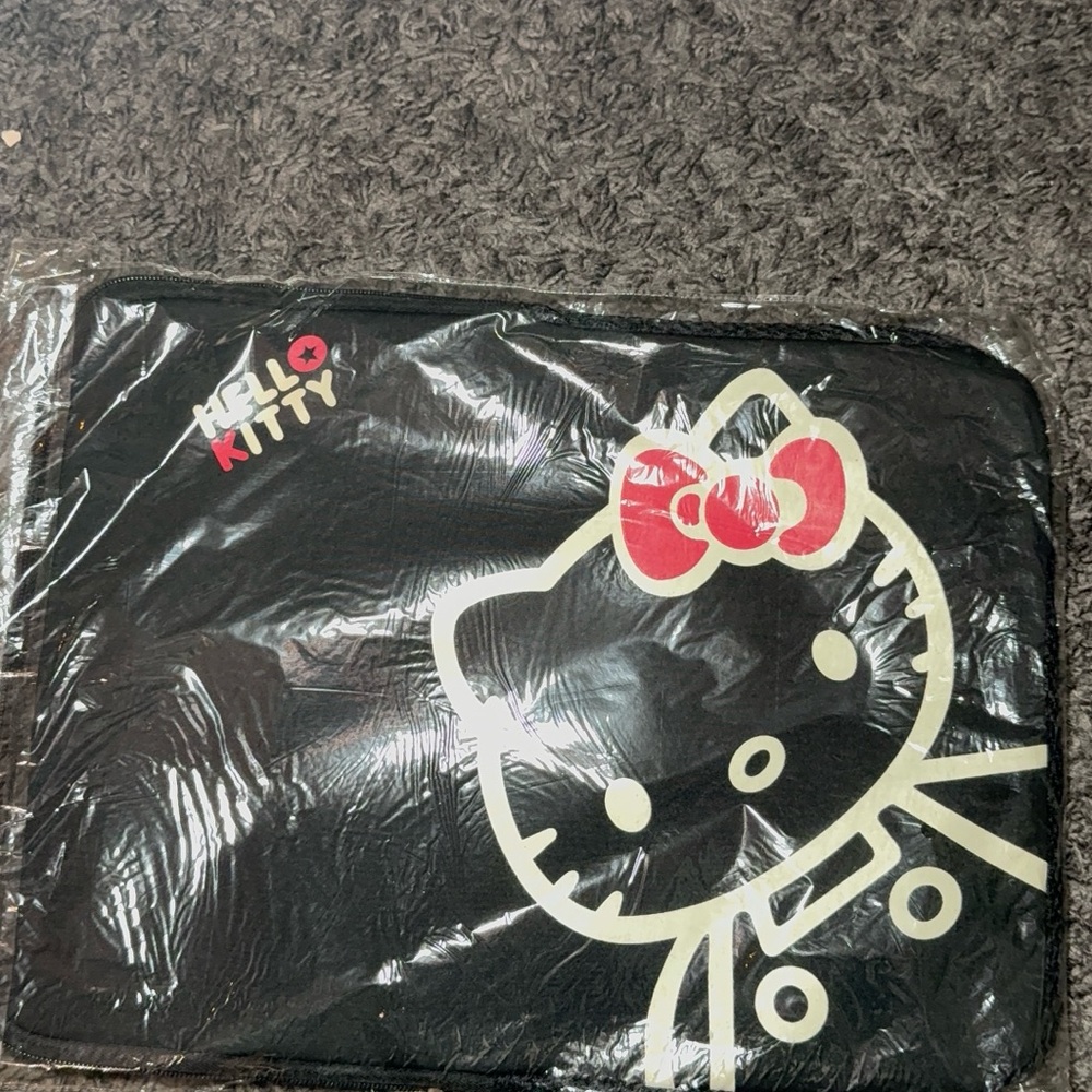 Hello Kitty Black Sleeve with Red Bow Graphic